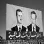 Henrik Brahe || President Bashar al-Assad and his father, Hafez al-Assad. Political poster. Bosra. Syria. 2001 || ©